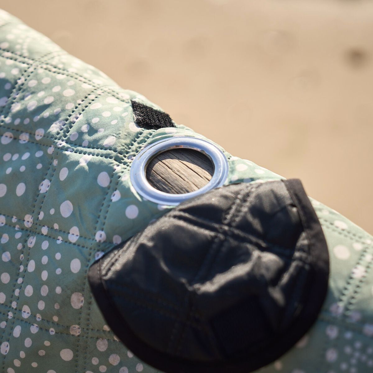 Corner cabana or umbrella grommet with flap